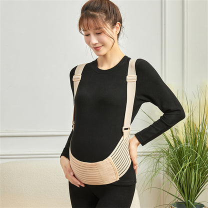 femme portant ceinture pour grossesse beige