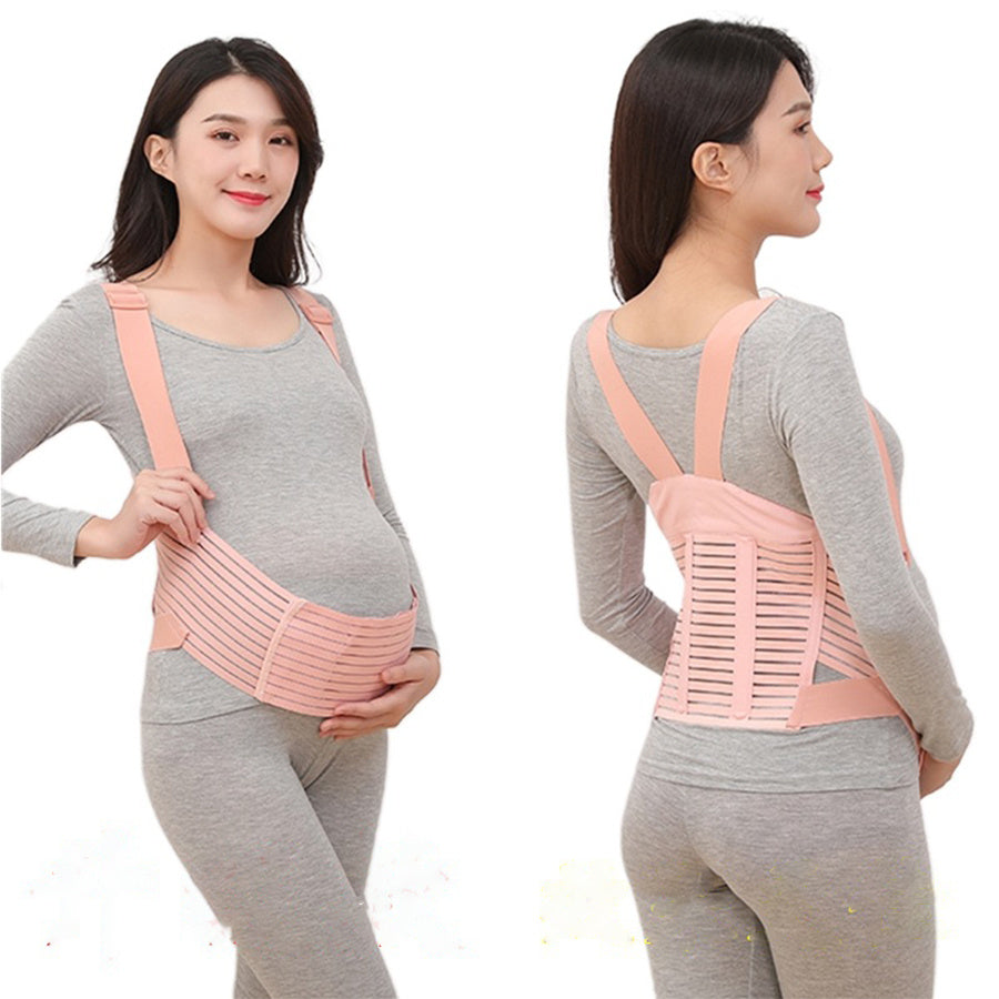 femme portant ceinture  pour grossesse rose