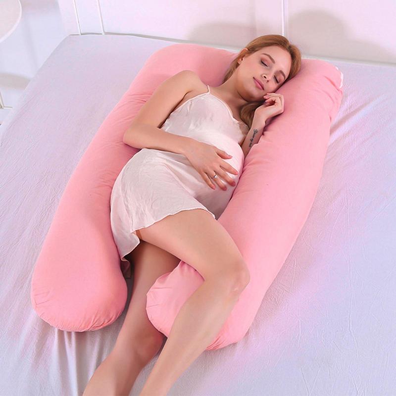 mama en robe dort coussin de grossesse pour dromir rose