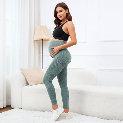 maman enceinte chambre legging de grossesse vert clair
