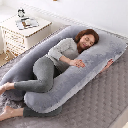 maman enceinte endormie sur le cote coussin de grossesse