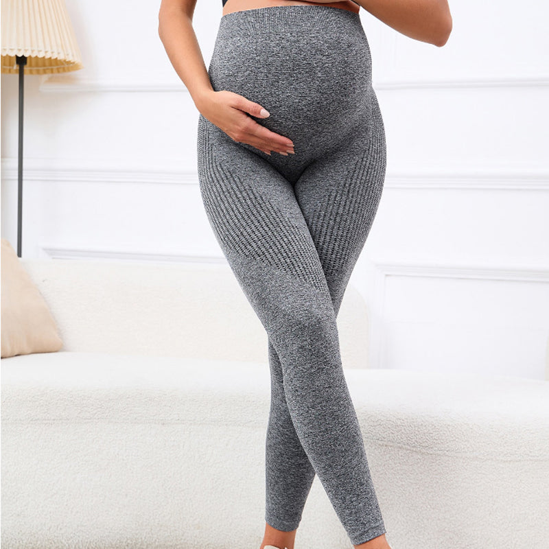 maman enceinte main ventre legging de grossesse