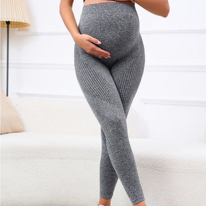 maman enceinte main ventre legging de grossesse