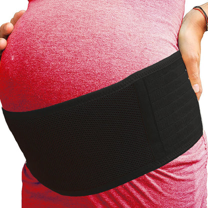 maman enceinte portant ceinture grossesse noire