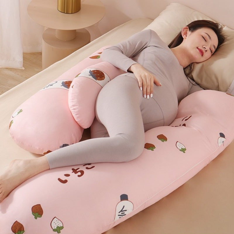 maman enciente dort coussin de grossesse rose