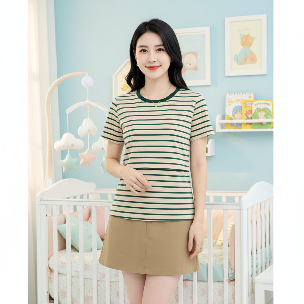 maman porte t shirt allaitement vert posant pour photo 
