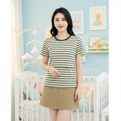 maman porte t shirt allaitement vert posant pour photo 