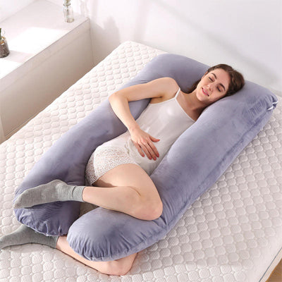 maman reve de son bebe avec coussin de grossesse